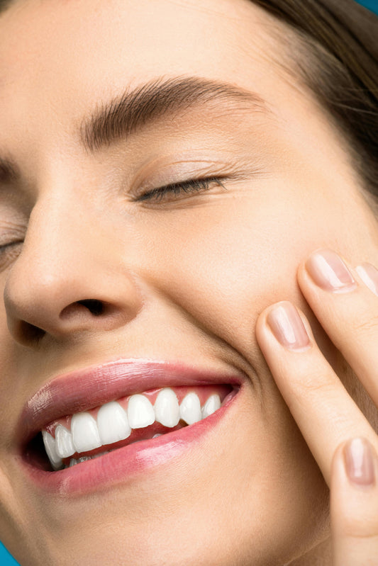 Woman using Naturally Balanced naturally Skincare on her face