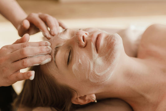 close up of a woman getting a facial massage
