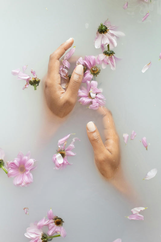 herbal bath with flower petals in it