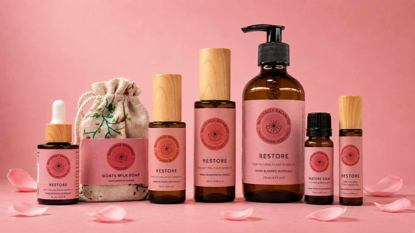 Collection of skincare products with 'Restore' branding on a pink background