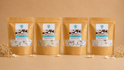 Four brown packaging bags with white labels on a beige background