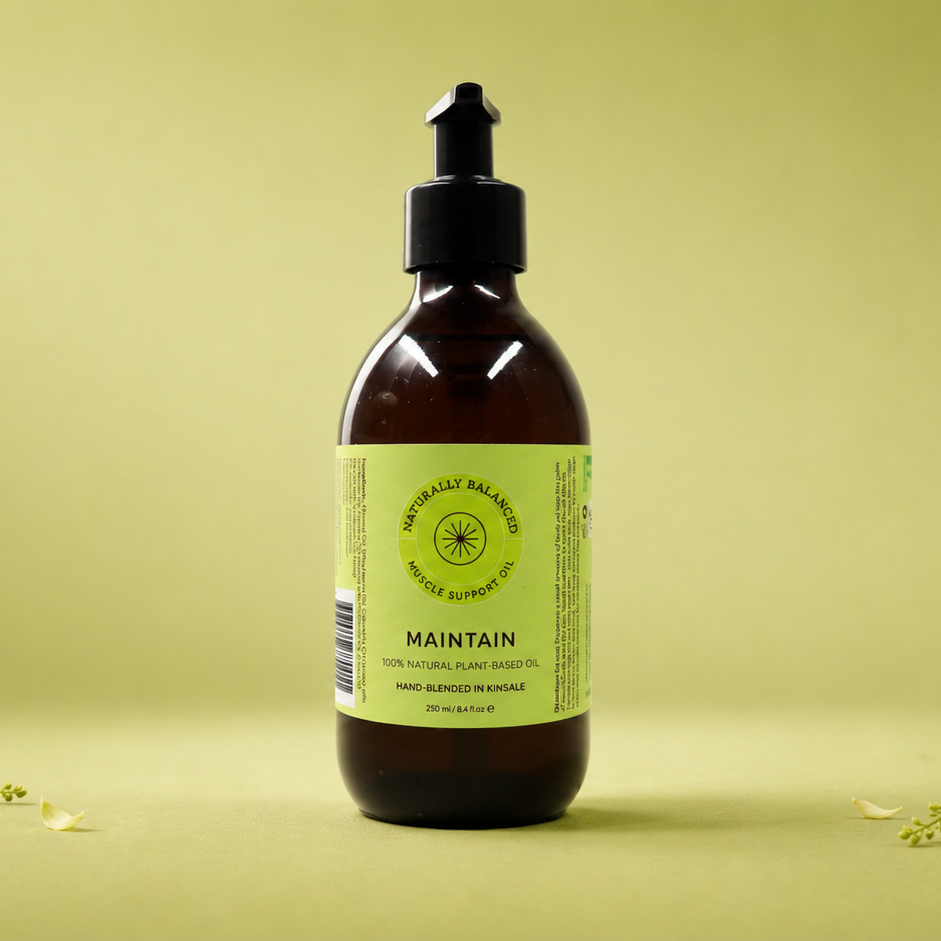 Bottle of 'Maintain' on a light green background with decorative elements.