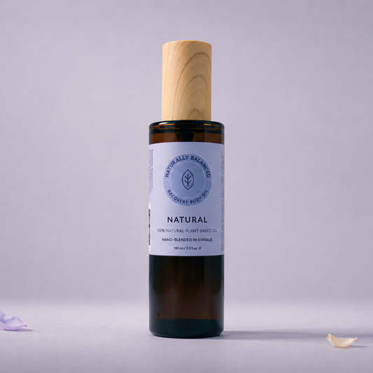 Bottle of natural product with a wooden cap on a light gray background