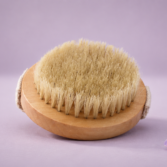Bare skin body brush on a wooden handle with a purple background