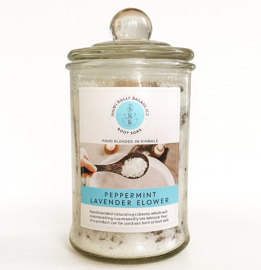 Jar of bath salts with a label on a white background
